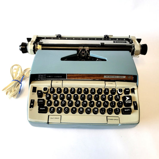 Smith Corona Electra 220 Typewriter showing blue case